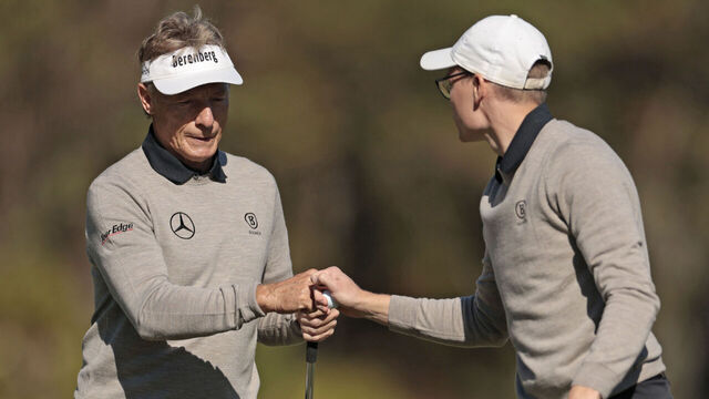 ORLANDO, FLORIDA - DECEMBER 22: Bernhard Langer of Germany and his son Jason Langer react on the second green during the second round of the PNC Championship at Ritz-Carlton Golf Club on December 22, 2024 in Orlando, Florida.