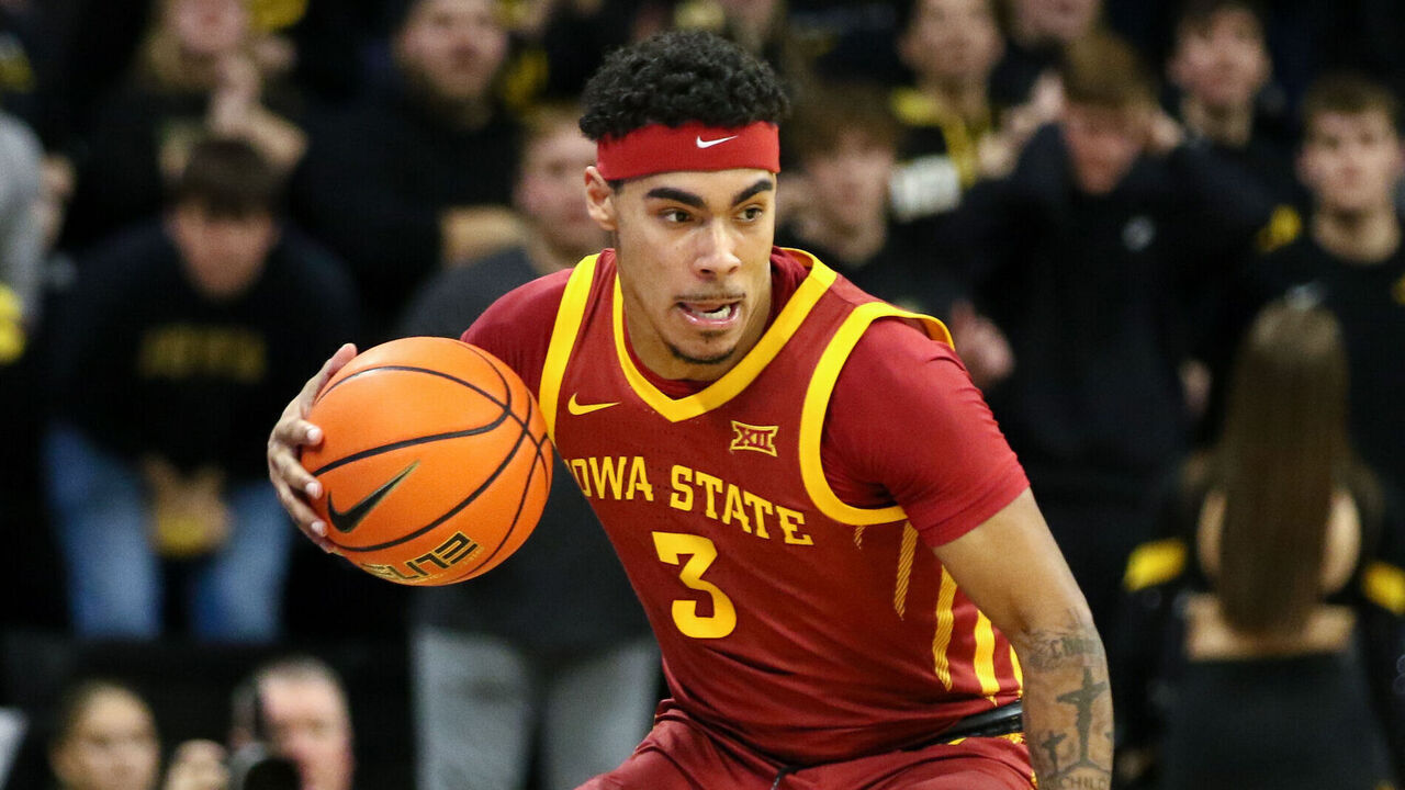 IOWA CITY, IOWA- DECEMBER 12: Guard Tamin Lipsey #3 of the Iowa State Cyclones goes down the court during the second half against guard Brock Harding #2 of the Iowa Hawkeyes, at Carver-Hawkeye Arena on December 12, 2024 in Iowa City, Iowa.
