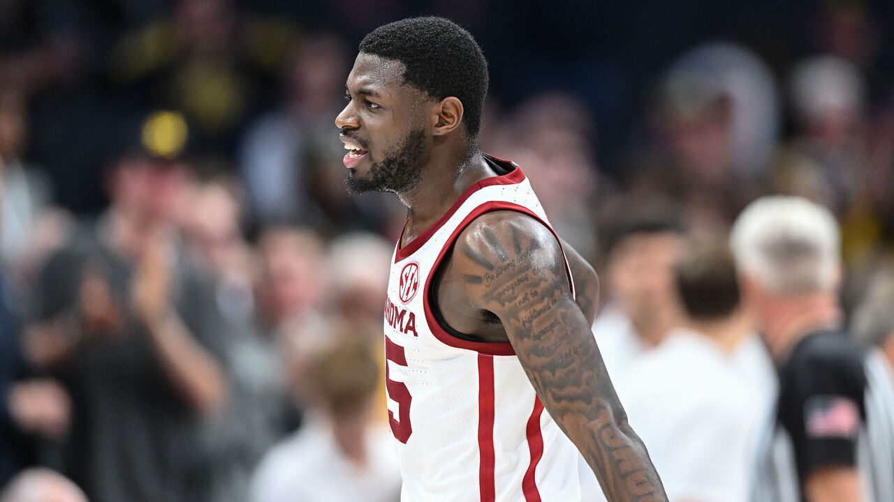 CHARLOTTE, NORTH CAROLINA - DECEMBER 18: Duke Miles #15 of the Oklahoma Sooners looks on in the second half of his game against the Michigan Wolverines during the Jumpman Invitational at Spectrum Center on December 18, 2024 in Charlotte, North Carolina.