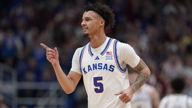 LAWRENCE, KANSAS - DECEMBER 22: Zeke Mayo #5 of the Kansas Jayhawks celebrates a basket against the Brown Bears in the second half at Allen Fieldhouse on December 22, 2024 in Lawrence, Kansas.