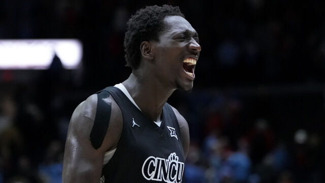 CINCINNATI, OHIO - DECEMBER 20: Aziz Bandaogo #55 of the Cincinnati Bearcats celebrates after beating the Dayton Flyers 66-59 at the Heritage Bank Center on December 20, 2024 in Cincinnati, Ohio.