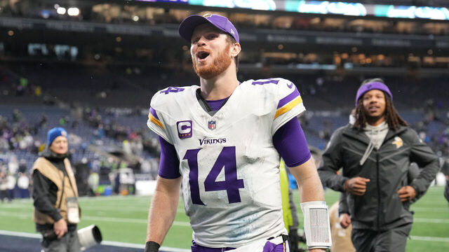 SEATTLE, WASHINGTON - DECEMBER 22: Sam Darnold #14 of the Minnesota Vikings celebrates as he leaves the field after his team defeated the Seattle Seahawks at Lumen Field on December 22, 2024 in Seattle, Washington.