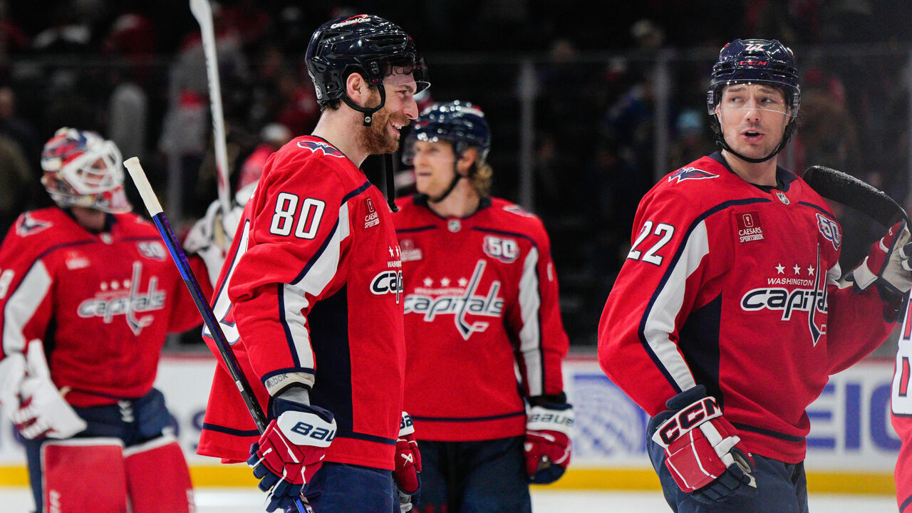 WASHINGTON, DC - DECEMBER 14: Pierre-Luc Dubois #80 smiles with Brandon Duhaime #22 of the Washington Capitals after the team wins a game against the Buffalo Sabres at Capital One Arena on December 14, 2024 in Washington, D.C.