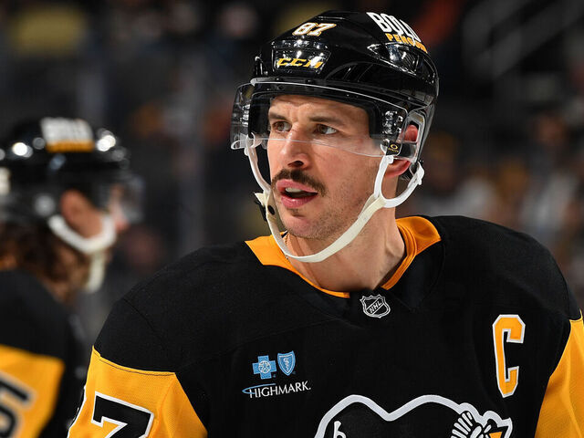 PITTSBURGH, PA - NOVEMBER 30: Sidney Crosby #87 of the Pittsburgh Penguins skates during the game against the Calgary Flames at PPG PAINTS Arena on November 30, 2024 in Pittsburgh, Pennsylvania.