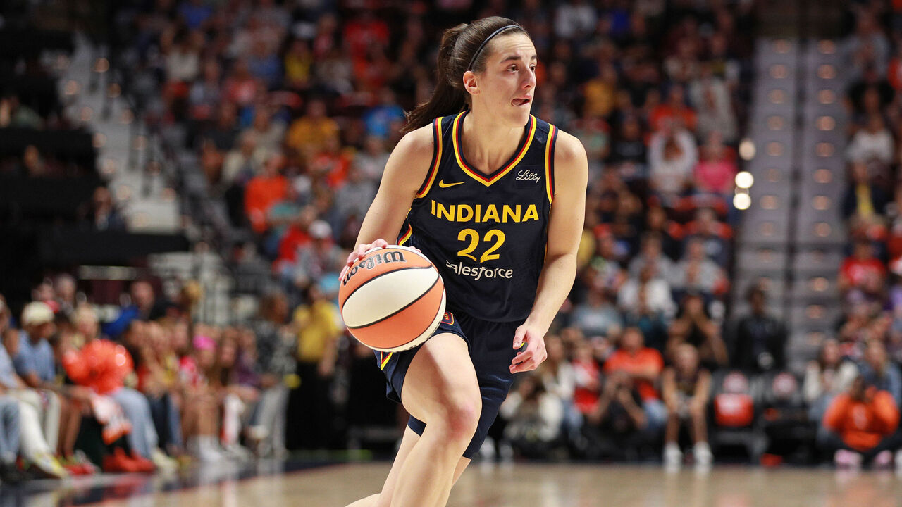 UNCASVILLE, CT - SEPTEMBER 22: Caitlin Clark #22 of the Indiana Fever dribbles the ball during the game against the Connecticut Sun during round one game one of the 2024 WNBA Playoffs on September 22, 2024 at the Mohegan Sun Arena in Uncasville, Connecticut. Mandatory Copyright Notice: Copyright 2024 NBAE
