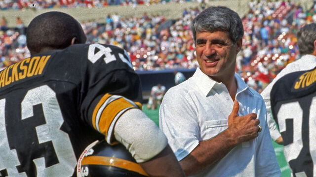 PITTSBURGH, PA - SEPTEMBER 13: Running backs coach Dick Hoak of the Pittsburgh Steelers talks to running back Earnest Jackson #43 during a game against the San Francisco 49ers at Three Rivers Stadium on September 13, 1987 in Pittsburgh, Pennsylvania. The Steelers defeated the 49ers 30-17.