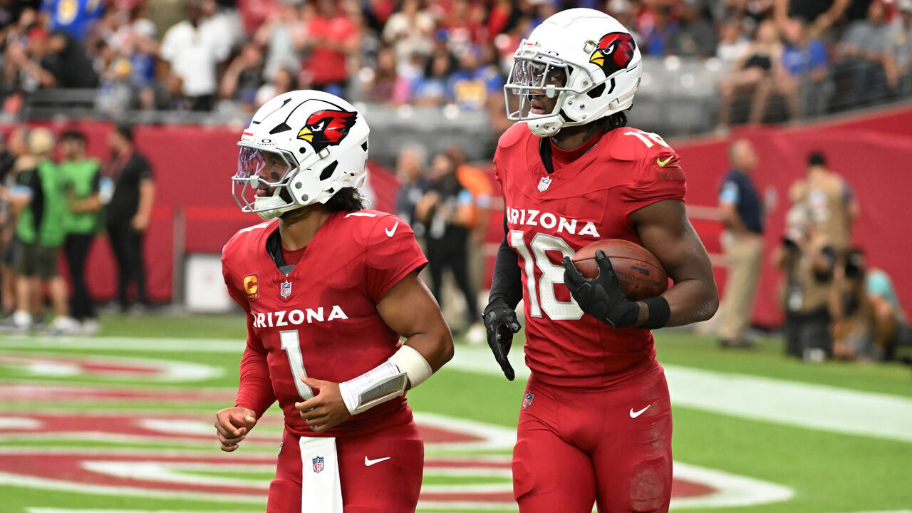 GLENDALE, ARIZONA - SEPTEMBER 15: Marvin Harrison Jr #18 of the Arizona Cardinals runs off the field with Kyler Murray #1 after scoring a touch down against the Los Angeles Rams at State Farm Stadium on September 15, 2024 in Glendale, Arizona.