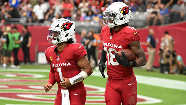 GLENDALE, ARIZONA - SEPTEMBER 15: Marvin Harrison Jr #18 of the Arizona Cardinals runs off the field with Kyler Murray #1 after scoring a touch down against the Los Angeles Rams at State Farm Stadium on September 15, 2024 in Glendale, Arizona.