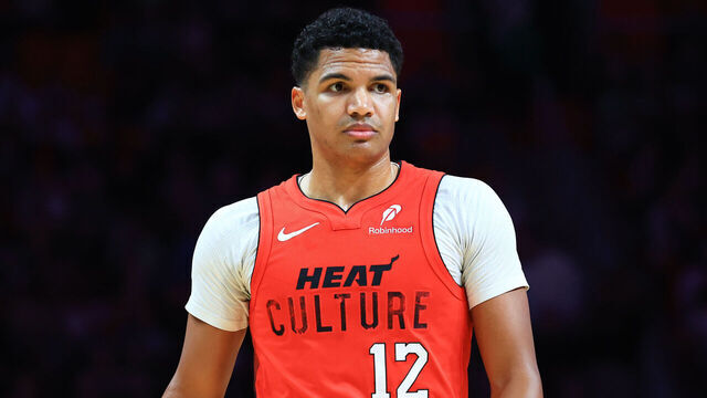 MIAMI, FLORIDA - DECEMBER 23: Dru Smith #12 of the Miami Heat looks on against the Brooklyn Nets during the second quarter of the game at Kaseya Center on December 23, 2024 in Miami, Florida.