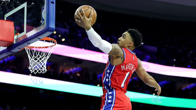 PHILADELPHIA, PENNSYLVANIA - DECEMBER 20: KJ Martin #1 of the Philadelphia 76ers drives to the basket during the first half against the Charlotte Hornets at the Wells Fargo Center on December 20, 2024 in Philadelphia, Pennsylvania.