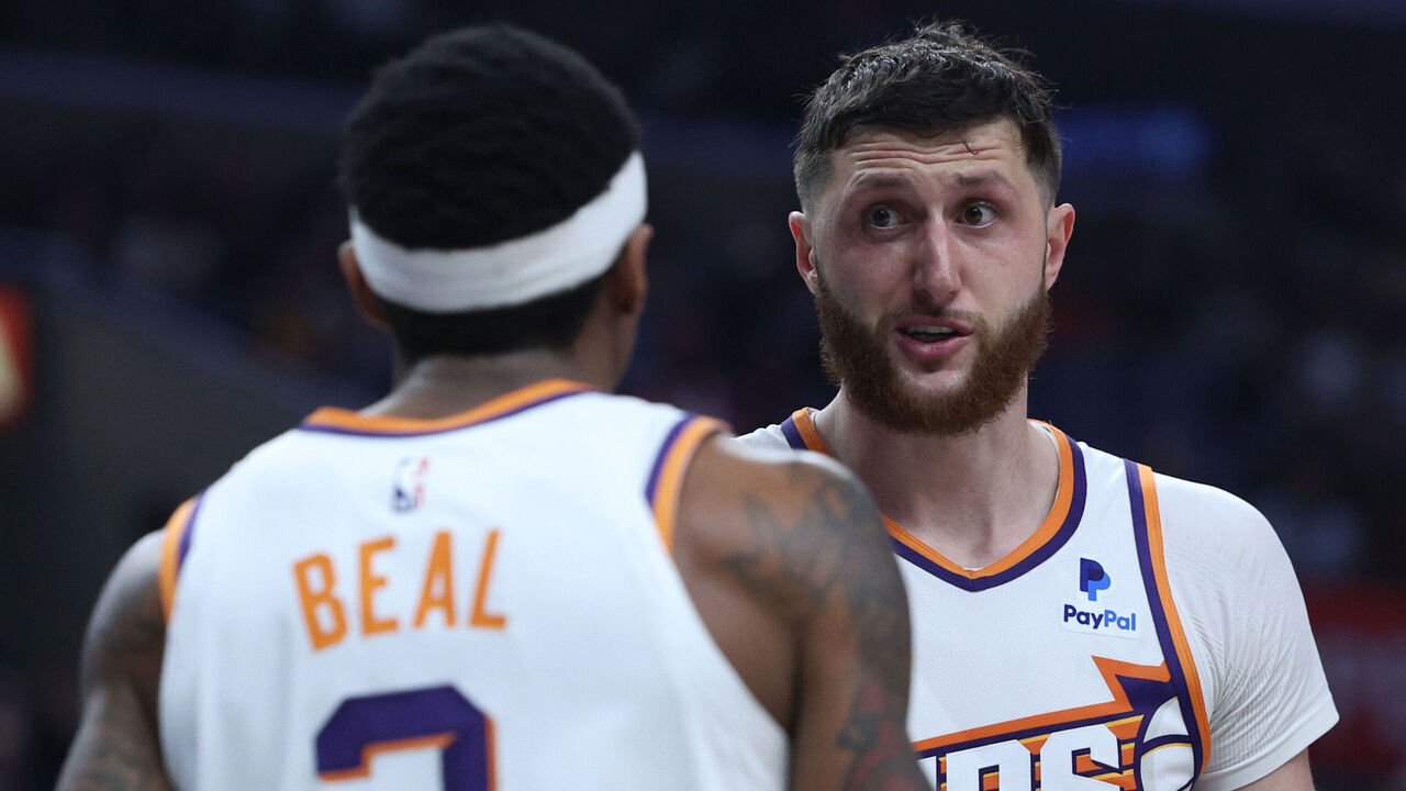 LOS ANGELES, CALIFORNIA - APRIL 10: Jusuf Nurkic #20 of the Phoenix Suns talks with Bradley Beal #3 during a 124-108 win over the LA Clippers at Crypto.com Arena on April 10, 2024 in Los Angeles, California. User is consenting to the terms and conditions of the Getty Images License Agreement.