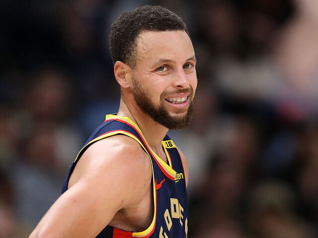 MEMPHIS, TENNESSEE - DECEMBER 19: Stephen Curry #30 of the Golden State Warriors reacts during the second half against the Memphis Grizzlies at FedExForum on December 19, 2024 in Memphis, Tennessee.