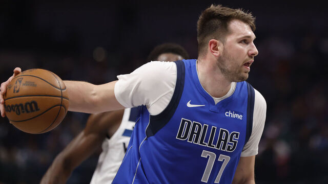 DALLAS, TX -DECEMBER 25 : Luka Doncic #77 of the Dallas Mavericks drives inside against the Minnesota Timberwolves in the first half at American Airlines Center on December 25, 2024 in Dallas, Texas.