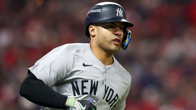 CLEVELAND, OH - OCTOBER 18: Gleyber Torres #25 of the New York Yankees runs to first base after hitting an RBI single in the ninth inning during Game 4 of the ALCS presented by loanDepot between the New York Yankees and the Cleveland Guardians at Progressive Field on Friday, October 18, 2024 in Cleveland, Ohio.
