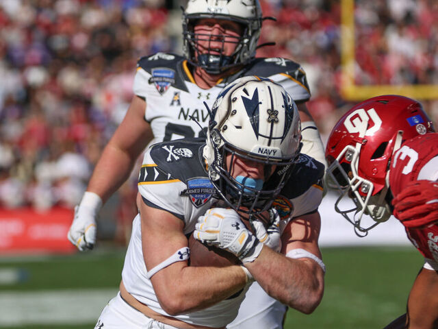 FORT WORTH, TX - DECEMBER 27: Navy Midshipmen fullback Alex Tecza (46) runs to the end zone for a touchdown during the Lockheed Martin Armed Forces Bowl between Oklahoma and Navy on December 27, 2024 at Amon G. Carter Stadium in Fort Worth, TX.
