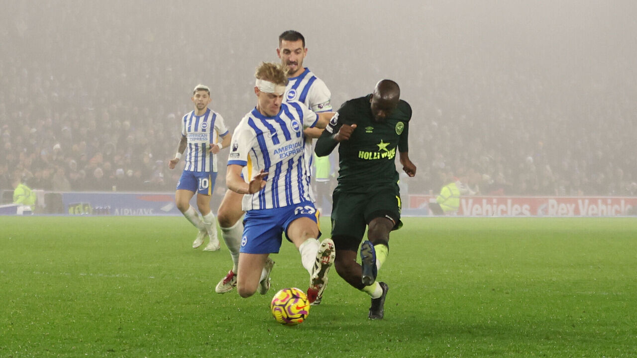 Brentford's Yoane Wissa (right) has a shot on goal past Brighton and Hove Albion's Jan Paul van Hecke (left) during the Premier League match at the Amex Stadium, Brighton and Hove. Picture date: Friday December 27, 2024.