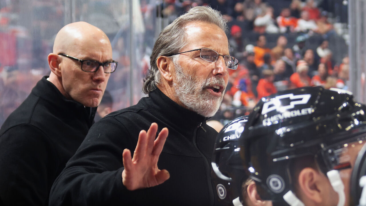 PHILADELPHIA, PENNSYLVANIA - DECEMBER 08: Head Coach of the Philadelphia Flyers John Tortorella gives instruction from his bench during the first period of his team's game against the Utah Hockey Club at the Wells Fargo Center on December 8, 2024 in Philadelphia, Pennsylvania.