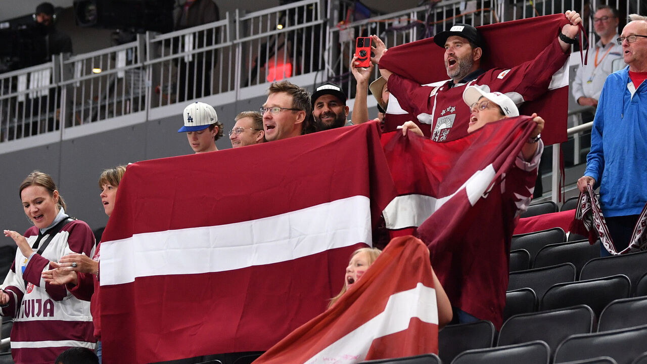 EDMONTON, AB - AUGUST 17: Fans of Latvia cheer during the game against Sweden in the IIHF World Junior Championship on August 17, 2022 at Rogers Place in Edmonton, Alberta, Canada