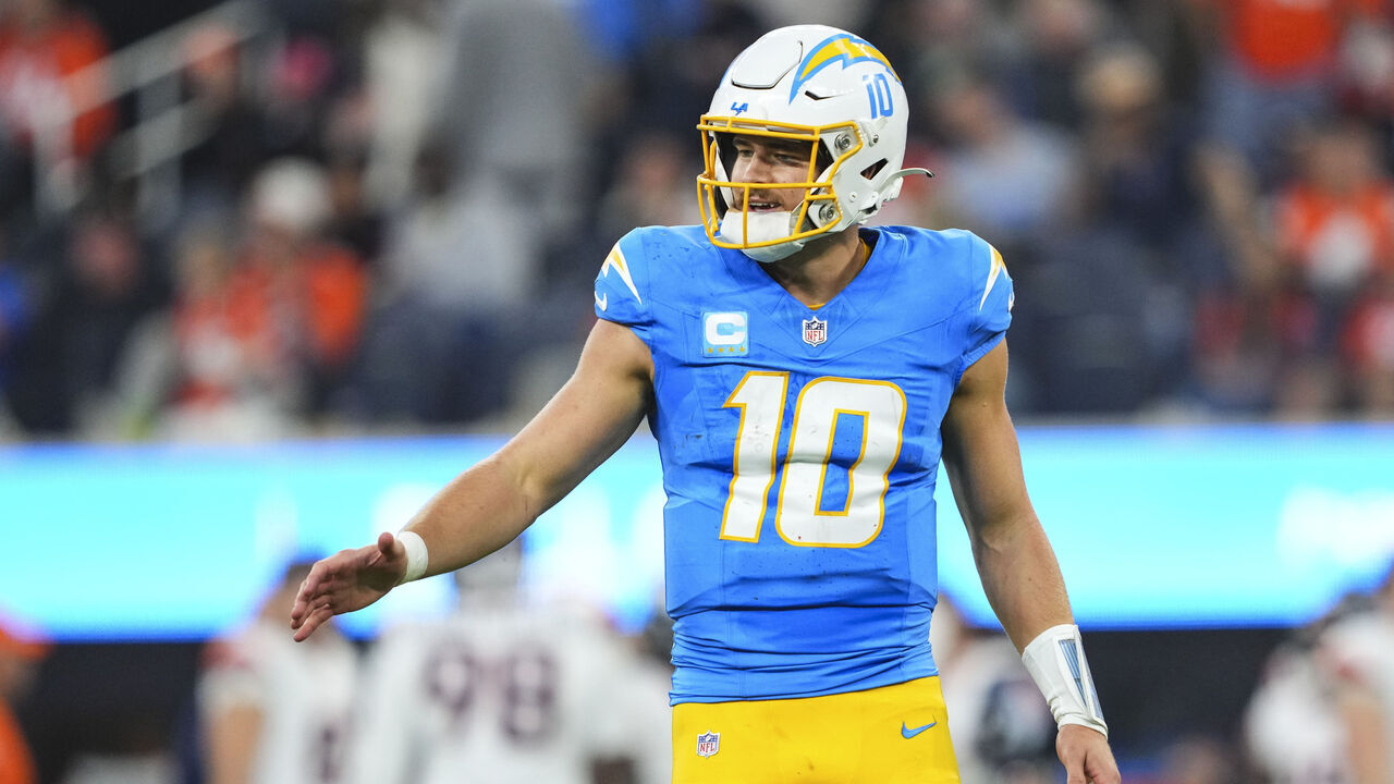 INGLEWOOD, CA - DECEMBER 19: Justin Herbert #10 of the Los Angeles Chargers celebrates during an NFL football game against the Denver Broncos at SoFi Stadium on December 19, 2024 in Inglewood, California.