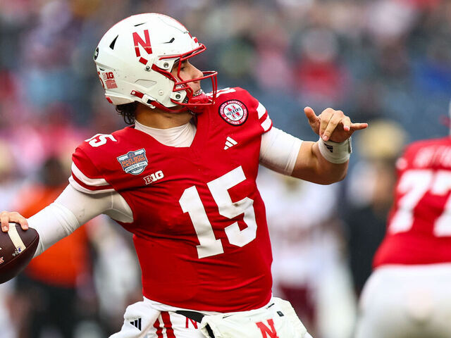 NEW YORK, NEW YORK - DECEMBER 28: Dylan Raiola #15 of the Nebraska Cornhuskers throws a pass during the first quarter of the Bad Boy Mowers Pinstripe Bowl against the Boston College Eagles at Yankee Stadium on December 28, 2024 in New York City.