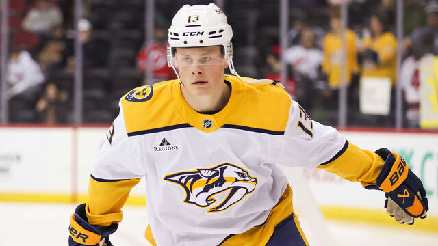 NEWARK, NJ - NOVEMBER 25: Nashville Predators center Juuso Parssinen (13) warms up before a NHL game between the Nashville Predators and New Jersey Devils at Prudential Center on November 25, 2024 in Newark, New Jersey.