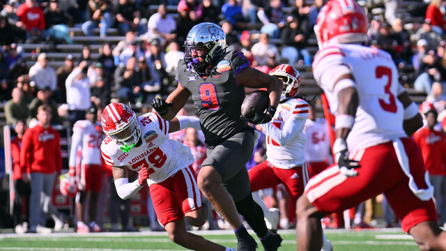 ALBUQUERQUE, NEW MEXICO - DECEMBER 28: Tight end Drake Dabney #9 of the TCU Horned Frogs runs for yardage against safety Kody Jackson #28 of the Louisiana Ragin' Cajuns during the first half of the Isleta New Mexico Bowl at University Stadium on December 28, 2024 in Albuquerque, New Mexico.