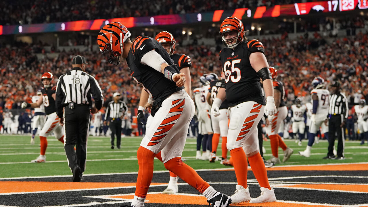 CINCINNATI, OHIO - DECEMBER 28: Joe Burrow #9 of the Cincinnati Bengals celebrates after scoring a touchdown during the fourth quarter against the Denver Broncos at Paycor Stadium on December 28, 2024 in Cincinnati, Ohio.