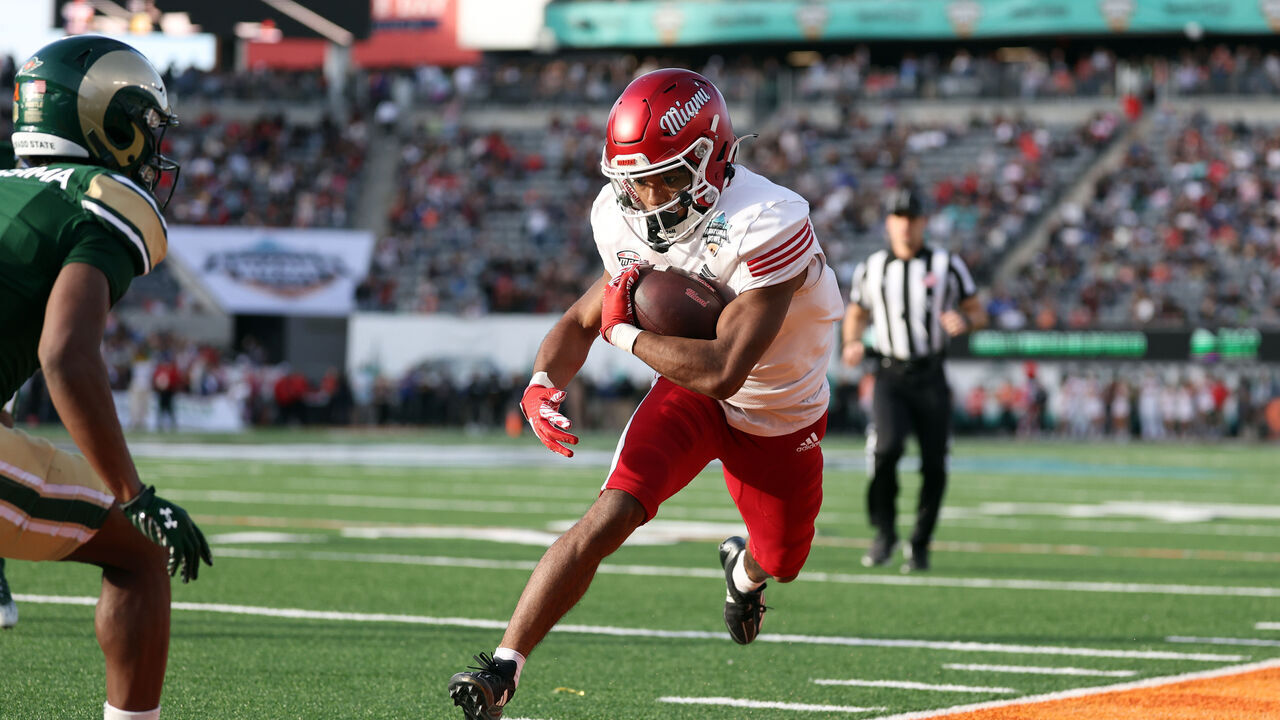TUCSON, ARIZONA - DECEMBER 28: Running back Kevin Davis #8 of the Miami (OH) RedHawks runs out of bounds during the first half of the Snoop Dogg Arizona Bowl against the Colorado State Rams at Arizona Stadium on December 28, 2024 in Tucson, Arizona.