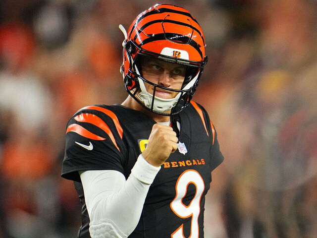 CINCINNATI, OH - SEPTEMBER 23: Joe Burrow #9 of the Cincinnati Bengals celebrates after scoring a touchdown against the Washington Commanders during the first half of an NFL football game at Paycor Stadium on September 23, 2024 in Cincinnati, Ohio.