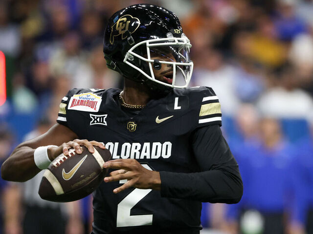 SAN ANTONIO, TX - DECEMBER 28: Colorado Buffaloes quarterback Shedeur Sanders (2) readies to pass the ball during the football game between BYU Cougars and Colorado Buffalos on December 28, 2024, at the Alamodome in San Antonio, Texas.