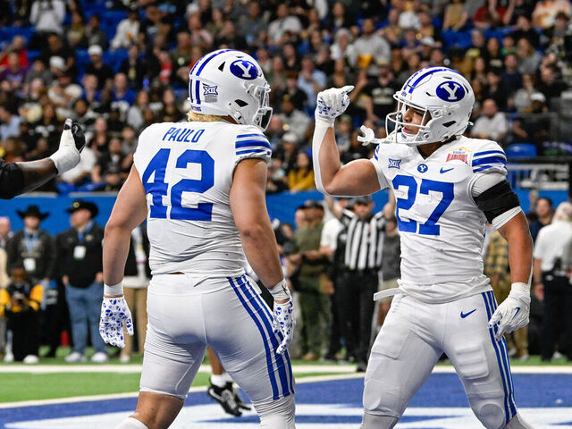 SAN ANTONIO, TX - DECEMBER 28: Brigham Young Cougars running back LJ Martin (27) celebrates his first half rushing touchdown during the football game between the BYU Cougars and Colorado Buffaloes on December 28, 2024, at the Alamodome in San Antonio, Texas.
