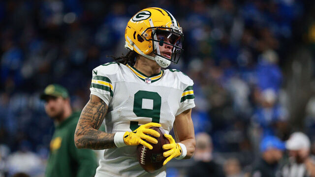 DETROIT,MICHIGAN-December 5: Green Bay Packers wide receiver Christian Watson #9 warms up prior to an NFL football game between the Green Bay Packers and the Detroit Lions at Ford Field in Detroit, Michigan USA, on Thursday, December 5, 2024.