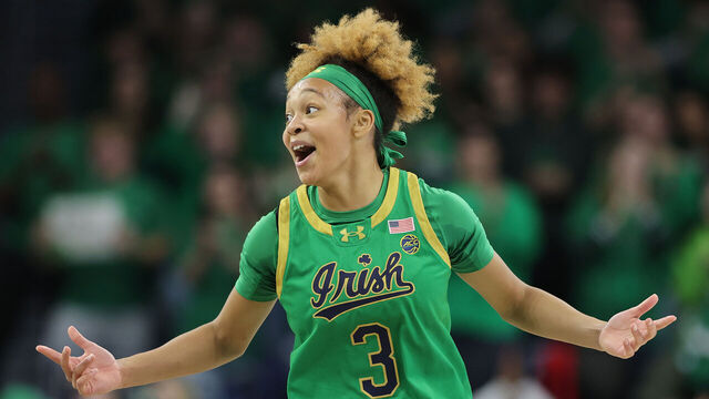 SOUTH BEND, INDIANA - DECEMBER 12: Hannah Hidalgo #3 of the Notre Dame Fighting Irish celebrates a three pointer by Liatu King #20 (not pictured) against the UConn Huskies during the first half at Purcell Pavilion at the Joyce Center on December 12, 2024 in South Bend, Indiana.