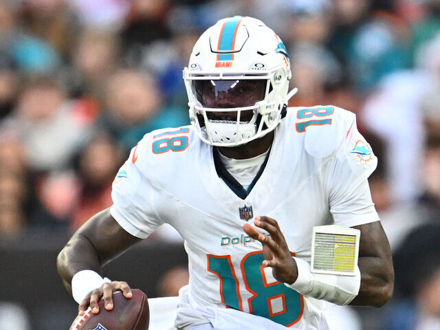 CLEVELAND, OHIO - DECEMBER 29: Tyler Huntley #18 of the Miami Dolphins scrambles during the first quarter against the Cleveland Browns at Huntington Bank Field on December 29, 2024 in Cleveland, Ohio.