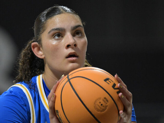 LONG BEACH, CALIFORNIA - DECEMBER 14: Lauren Betts #51 of the UCLA Bruins shoots a free throw against the Long Beach State 49ers at Walter Pyramid on December 14, 2024 in Long Beach, California.