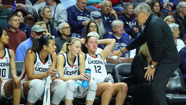 UNCASVILLE, CT - DECEMBER 17: UConn Huskies head coach Geno Auriemma speaks with his players during the 2024 college Basketball Hall of Fame Women's Showcase game between Iowa State Cyclones and UConn Huskies on December 17, 2024, at Mohegan Sun Arena in Uncasville, CT.