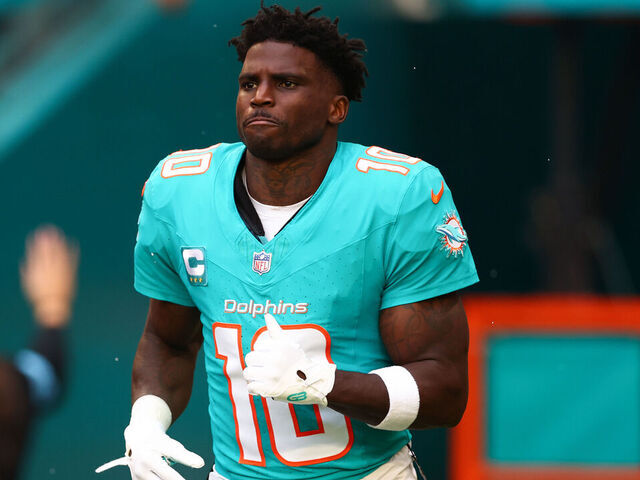 MIAMI GARDENS, FLORIDA - DECEMBER 22: Tyreek Hill #10 of the Miami Dolphins takes the field prior to a game against the San Francisco 49ers at Hard Rock Stadium on December 22, 2024 in Miami Gardens, Florida.