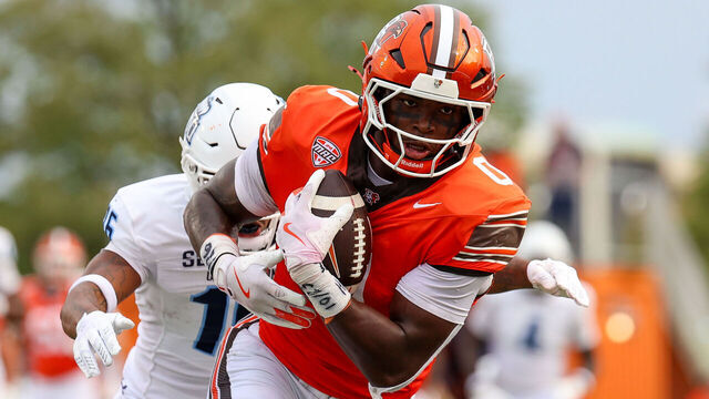 BOWLING GREEN, OHIO - SEPTEMBER 28: Harold Fannin Jr. #0 of the Bowling Green Falcons catches the ball against Khian'Dre Harris #16 of the Old Dominion Monarchs at Doyt Perry Stadium on September 28, 2024 in Bowling Green, Ohio.