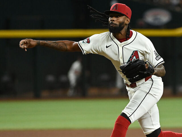 PHOENIX, ARIZONA - APRIL 15: Miguel Castro #42 of the Arizona Diamondbacks delivers a pitch against the Chicago Cubs at Chase Field on April 15, 2024 in Phoenix, Arizona. All players are wearing the number 42 in honor of Jackie Robinson Day.