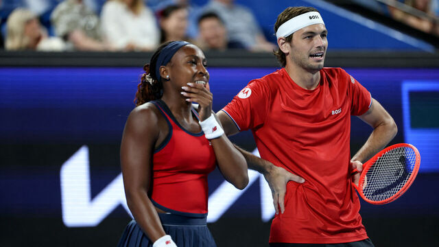 USA's Coco Gauff and Taylor Fritz (R) hits discuss tactics against Canada's Leylah Fernandez and Felix Auger-Aliassime during their doubles match at the United Cup tennis tournament in Perth on December 29, 2024.