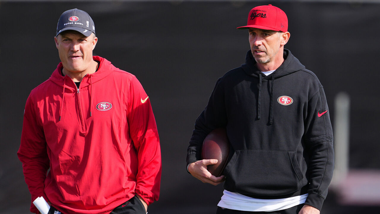 LAS VEGAS, NEVADA - FEBRUARY 08: (L-R) General manager John Lynch and head coach Kyle Shanahan look on during San Francisco 49ers practice ahead of Super Bowl LVIII at Fertitta Football Complex on February 07, 2024 in Las Vegas, Nevada.