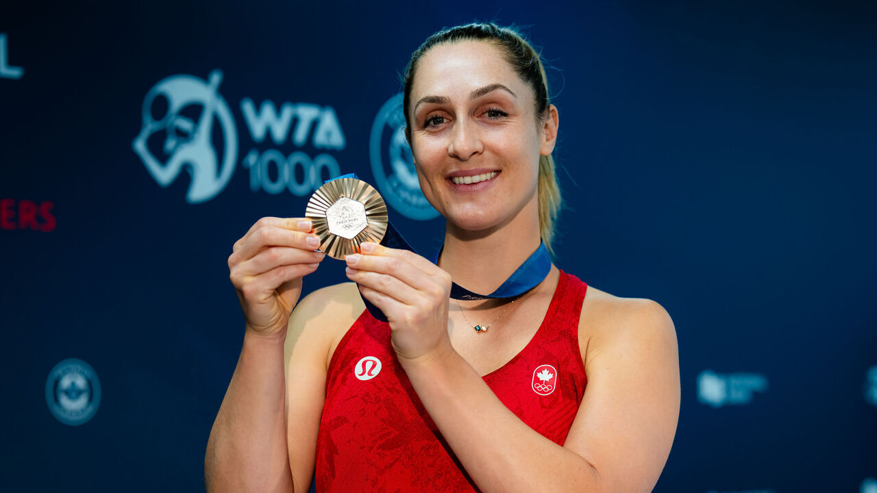 TORONTO, ONTARIO - AUGUST 05: Gabriela Dabrowski of Canada poses with her Olympic bronze medal during Media Day ahead of the National Bank Open Presented by Rogers at Sobeys Stadium on August 05, 2024 in Toronto, Ontario
