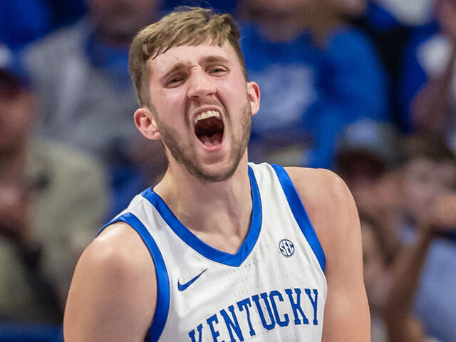 LEXINGTON, KENTUCKY - DECEMBER 31: Andrew Carr #7 of the Kentucky Wildcats reacts during the first half against the Brown Bears at Rupp Arena on December 31, 2024 in Lexington, Kentucky.