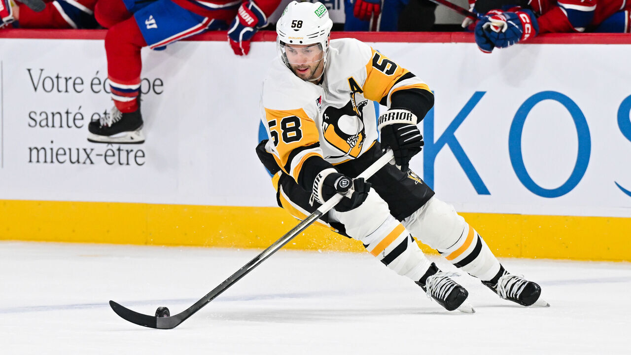 MONTREAL, CANADA - DECEMBER 12: Kris Letang #58 of the Pittsburgh Penguins skates the puck during the second period against the Montreal Canadiens at the Bell Centre on December 12, 2024 in Montreal, Quebec, Canada. The Pittsburgh Penguins defeated the Montreal Canadiens 9-2.