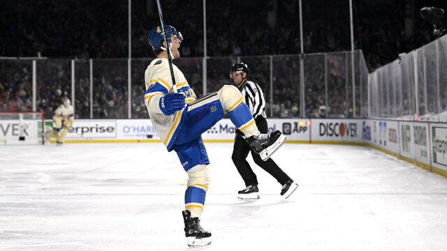 CHICAGO, ILLINOIS - DECEMBER 31: Cam Fowler #17 of the St. Louis Blues celebrates after scoring a goal during the first period of the Discover NHL Winter Classic between the St. Louis Blues and the Chicago Blackhawks at Wrigley Field on December 31, 2024 in Chicago, Illinois.