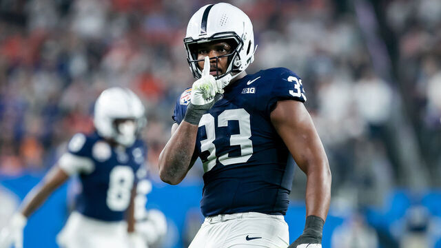 GLENDALE, AZ - DECEMBER 31: Penn State defensive end Dani Dennis-Sutton (33) celebrates a defensive stop during the Vrbo Fiesta Bowl quarterfinal playoff game between the Boise State Broncos and the Penn State Nittany Lions on Tuesday December 31, 2024 at State Farm Stadium in Glendale, AZ.