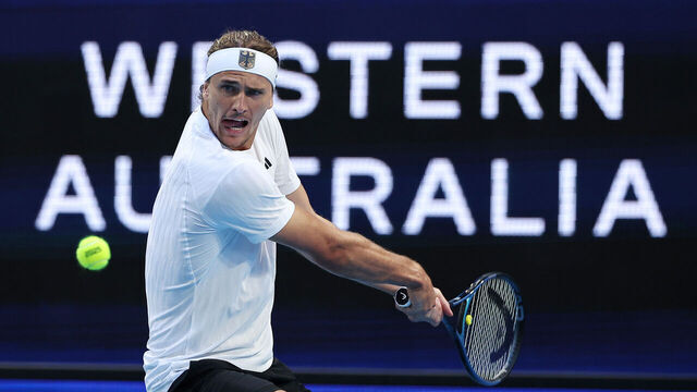 PERTH, AUSTRALIA - DECEMBER 30: Alexander Zverev of Germany plays a forehand in the Men's singles match against Zhang Zhizhen of China during day four of the 2025 United Cup at RAC Arena on December 30, 2024 in Perth, Australia.