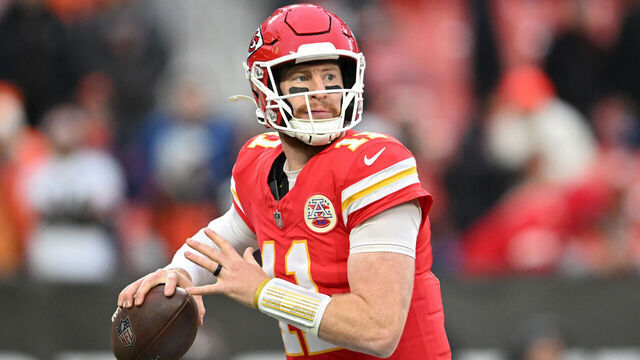 CLEVELAND, OHIO - DECEMBER 15: Carson Wentz #11 of the Kansas City Chiefs looks to throws a pass against the Cleveland Browns during the fourth quarter at Huntington Bank Field on December 15, 2024 in Cleveland, Ohio.