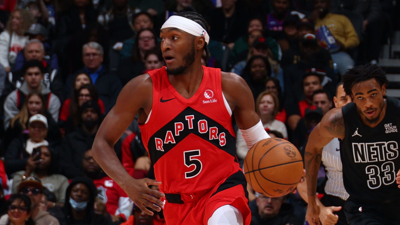 TORONTO, CANADA - JANUARY 01: Immanuel Quickley #5 of the Toronto Raptors dribbles the ball during the game against the Brooklyn Nets on January 1, 2025 at the Scotiabank Arena in Toronto, Ontario, Canada. Mandatory Copyright Notice: Copyright 2025 NBAE