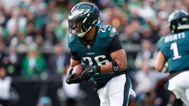 PHILADELPHIA, PA - DECEMBER 08: Philadelphia Eagles running back Saquon Barkley (26) carries the ball in the first half during the game between the Carolina Panthers and Philadelphia Eagles on December 08, 2024 at Lincoln Financial Field in Philadelphia, PA.